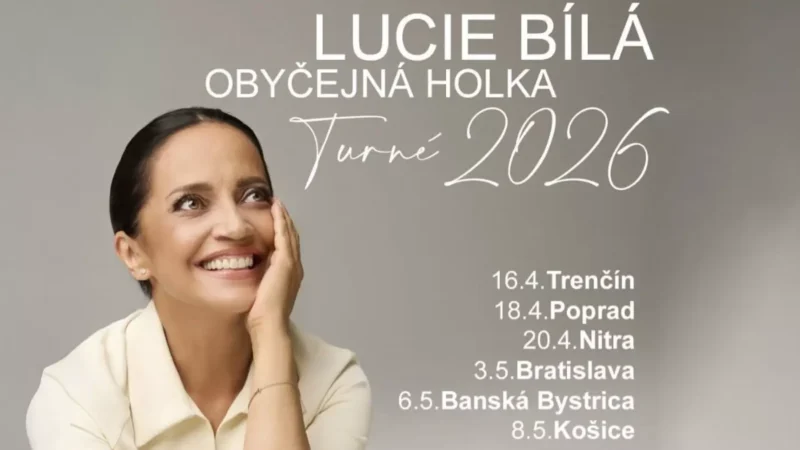Žena sa usmieva a tvár si opiera o ruku. Text znie: "Lucie Bílá, Obyčejná Holka Turné 2026." Dátumy turné a miesta uvedené vedľa nej.