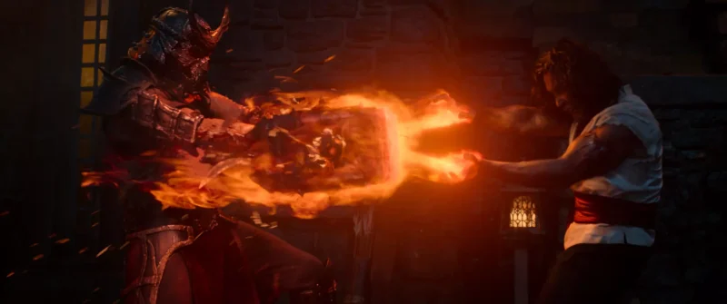 Dve postavy v nočnej bitke: bojovník v prilbe vyžaruje ohnivú energiu a stretáva sa s protivníkom v bielej košeli a červenej šerpe. Intenzívne a dramatické.