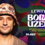 Vľavo na žiarivom, abstraktnom pozadí je muž so vzorovaným klobúkom a neutrálnym výrazom. Vpravo je nápis „Levity“ a „Bora Uzer“ s podrobnosťami o udalosti „24. júla“ v „Neptúne“. Tón je živý a umelecký.
